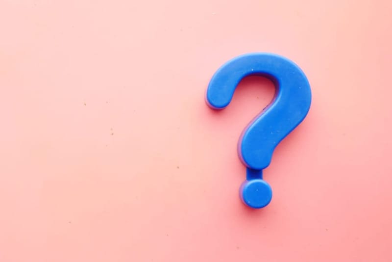 https://unsplash.com/photos/a-blue-question-mark-on-a-pink-background-oZuBNC-6E2s